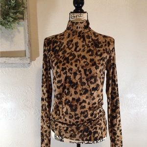 Cabi Long Sleeve, Crew Neck, Animal Print Top. Fall and Winter ready.